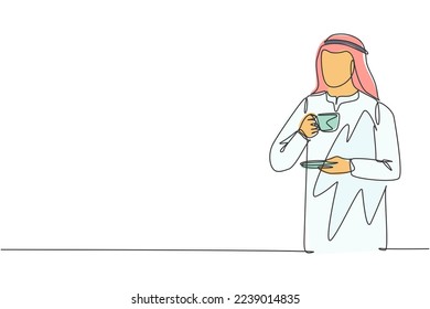 One single line drawing of young male muslim businessman enjoying drink a cup coffee while standing at office corridor. Islamic cloth shemag, kandura, scarf. Continuous line draw design illustration