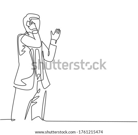 One single line drawing of young male startup CEO walking and holding a smartphone to receive call from his colleague. Business talk concept continuous line draw design vector graphic illustration
