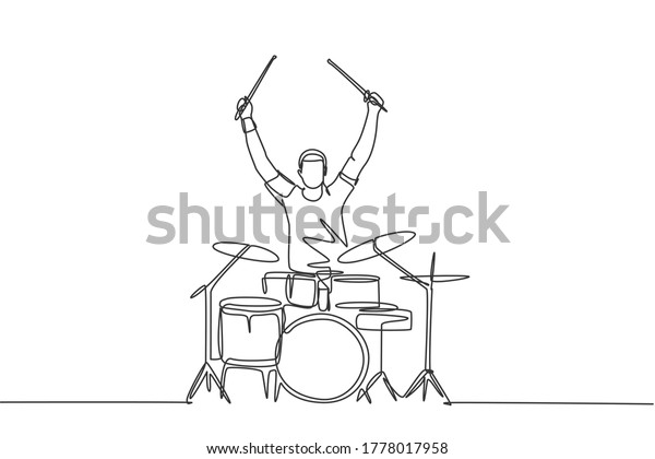 One single line drawing of young happy male\
drummer raise drumstick up while play drum set on music concert\
stage. Musician artist performance concept continuous line draw\
design vector illustration