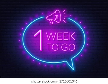 One Week To Go Neon Sign On Brick Wall Background.