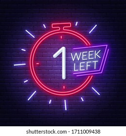 One week left neon sign on brick wall background.