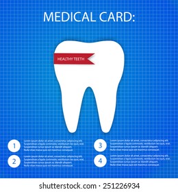 one white tooth on the blueprint paper