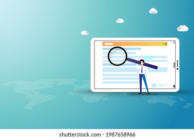 Online application concept, young man hold a big magnifier and focus on a big screen of tablet to find a course to apply in the university and or job application after graduation in green background