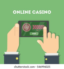 Online casino in the tablet. Hands holding device with gambling game. Gaming addiction.