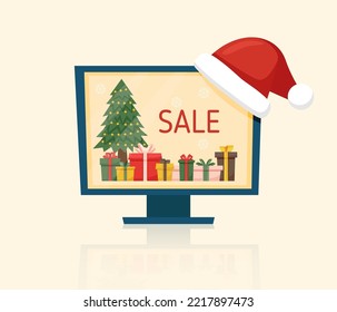 Online Christmas shopping concept - computer with gift boxes for buying online