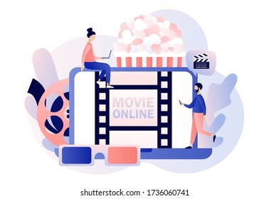 Online cinema concept. Home movie theater. Cinematography. Tiny people watching movie with popcorn,3d glasses and video attributes. Modern flat cartoon style. Vector illustration on white background