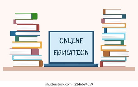 Online education concept - laptop and stacks of books