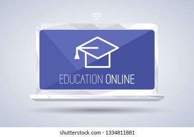 Online education concept with screen of laptop and graduation hat on blue background. Training courses, e-learning, distance learning