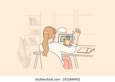 Online education, distant learning during pandemic concept. Homeschool girl student sitting backwards greeting teacher during virtual internet online class during coronavirus epidemic and lockdown