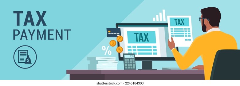 Online e-tax payment on computer: man checking tax forms on his computer and paying with a credit card
