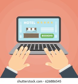 Online hotel booking. Hands typing on the laptop to book a room in the hotel.