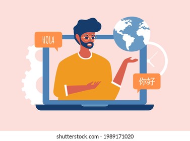 Online language courses concept.  A male teacher with a globe in his hand and a laptop says hello in different languages.