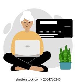 Online payment concept. Close up of a large credit card. An old woman sits cross-legged, holding a laptop in his hand. Vector flat illustration