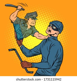 Online security. A police officer detains a thief. Pop art retro vector illustration 50s 60s style