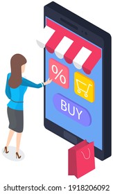 Online shopping concept. Business woman standing with shopping bag near her phone chooses products. Girl selects products on touchscreen, clicks buttons on website of online store with application