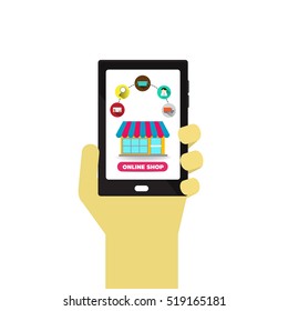 On-line shopping concept desktop with computer, table, shopping bags, credit cards, and jobs
