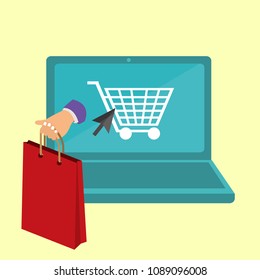 Online shopping concept with open laptop and hand