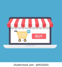 Online shopping concept with open laptop and online shop