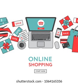 Online shopping concept. Online store objects and banner. Table with laptop, shopping bags, credit cards, gifts and coupons. Flat style, vector illustration.