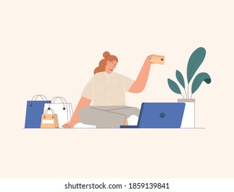 Online shopping concept, woman sitting at a laptop and shopping and pay online. Flat style vector illustration.