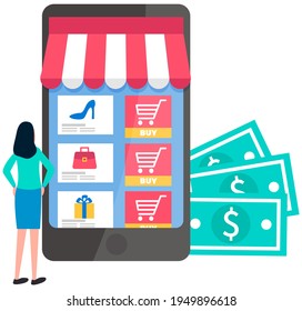 Online shopping concept. Woman standing near her phone in form of trade stall chooses products