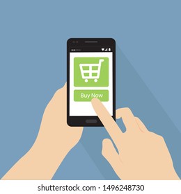 Online shopping with hand holing smart phone with buy button on the screen.