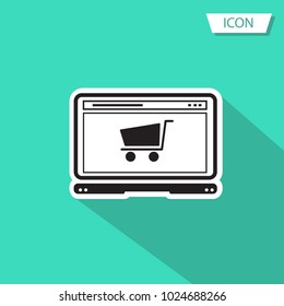 Online shopping on computer isolated on green background.