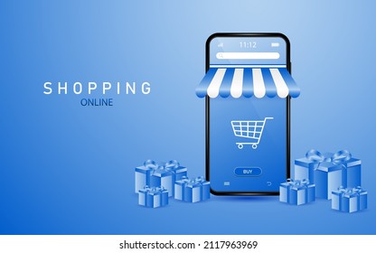 Online shopping on smartphone with shopping cart icon on screen with gift boxes lying around on blue background.
