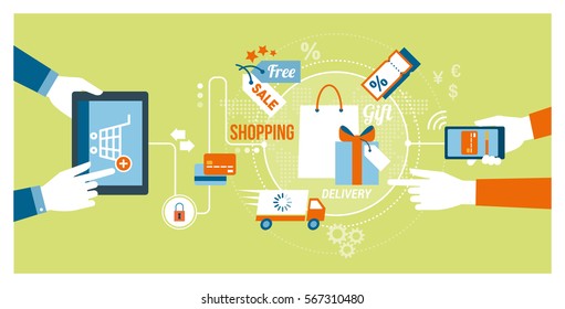 Online shopping and technology concept: users buying products and gifts online using a tablet and a smartphone