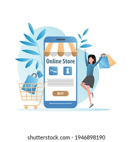 Tienda online en el sitio, aplicación en smartphone. Chica con bolsas de papel compra cosas, bienes, productos en Internet con entrega a su casa, oficina. La mujer paga por compras sin contacto con tarjeta de crédito.