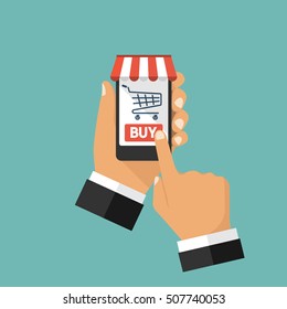 Online store on smartphone. Holding phone in hand, touching the screen button "Buy", a symbol shopping basket on the screen. Vector illustration flat design. Isolated on background.