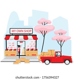 Online store showing lady stand in front of a big screen with delivery truck
