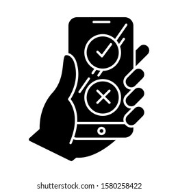 Online survey glyph icon. Checklist buttons on smartphone screen. Agree and disagree option. Share opinion. Correct and incorrect. Silhouette symbol. Negative space. Vector isolated illustration