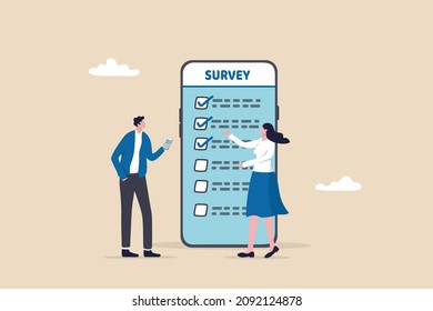 Online survey questionnaire, poll, opinion or customer feedback using internet concept, man and woman using mobile or smartphone to fill in online survey checklist.