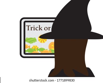 Online trick or treat, girl with witch hat looking at a screen with trick or treat text and candies