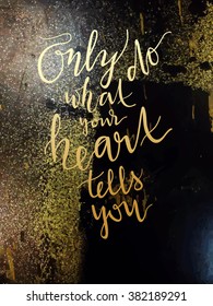 "Only do what your heart tells you" art print vector illustration. Hand written quotes on shabby textured background. Wedding or interior poster in black and yellow-gold colors.