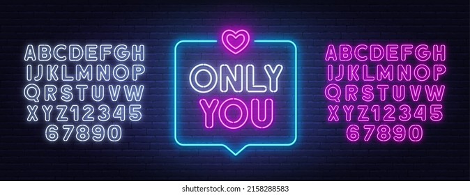 Only You neon lettering on brick wall background.