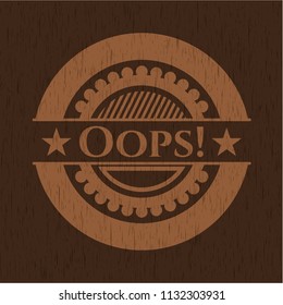 Oops! badge with wooden background