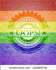 Oops! on mosaic background with the colors of the LGBT flag