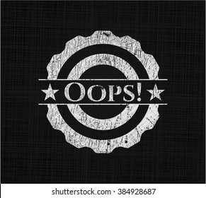 Oops! written on a chalkboard