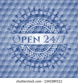 Open 24/7 blue emblem with geometric pattern.