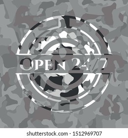 Open 24/7 written on a grey camouflage texture