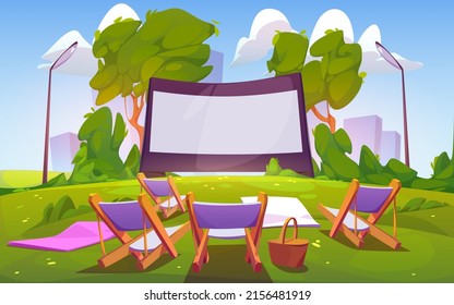 Open air cinema on green lawn in city park, garden or backyard. Vector cartoon summer landscape with empty outdoor movie theater with big screen, chaises, picnic baskets and blankets on grass