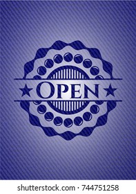 Open badge with denim background