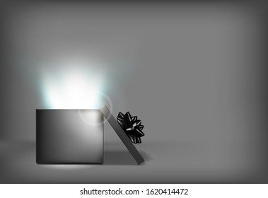 Open black gift box with black bow. Blue glow