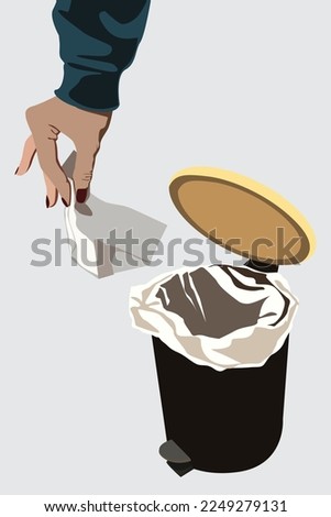 Open black trash can with a button for opening the lid and young womens hand holding white tissue trash.