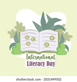 open book with alphabet letters literacy