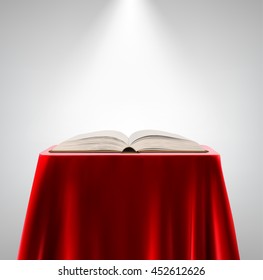 open book on a  pedestal 
