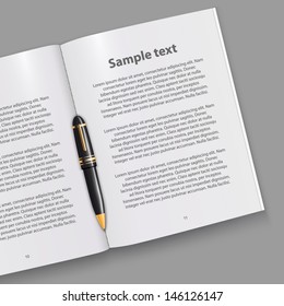 Open book with pen