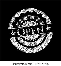 Open chalk emblem written on a blackboard